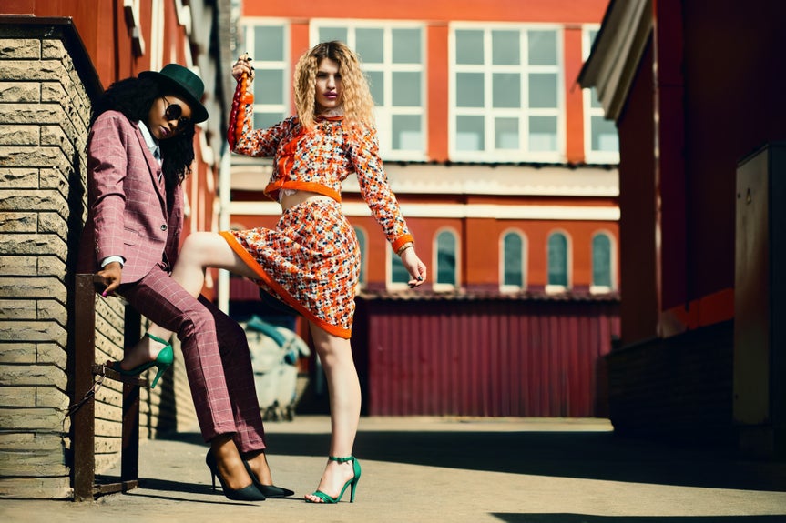 After image with car removed using object remover tool to enhance focus on the two women.