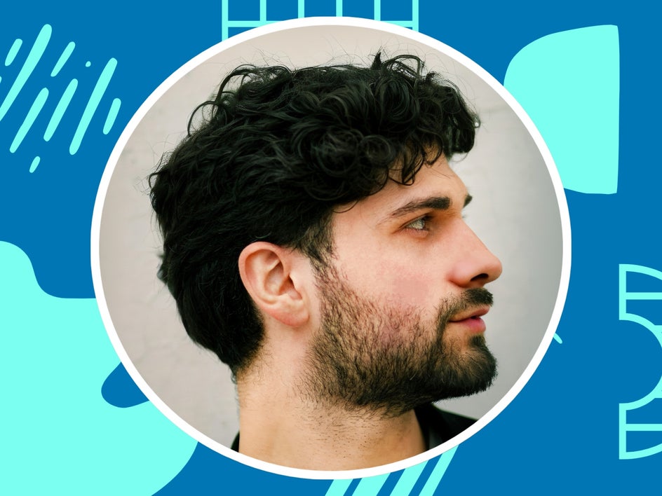 Before: Close up portrait of man with dark hair and plain background