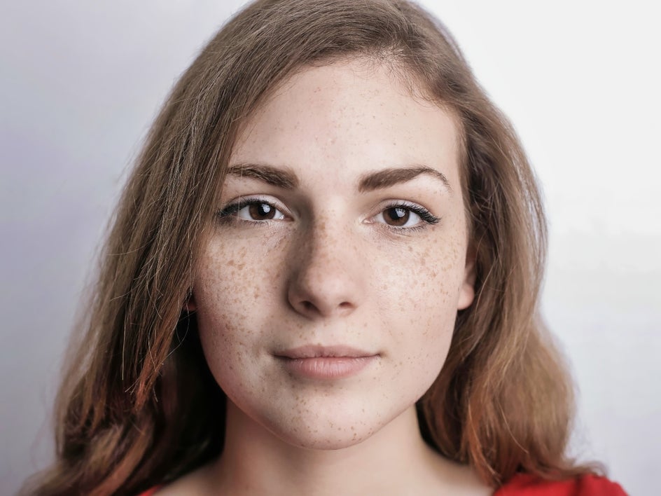 After: Same headshot with portrait enhancer applied for more detailed and colorful results