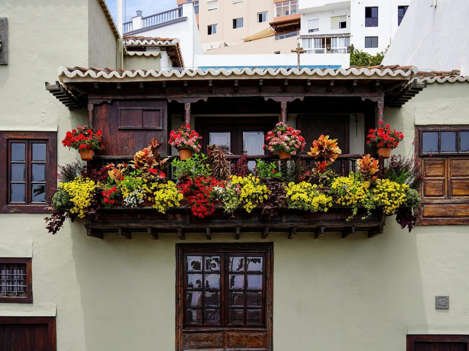 home with flowers on balcony