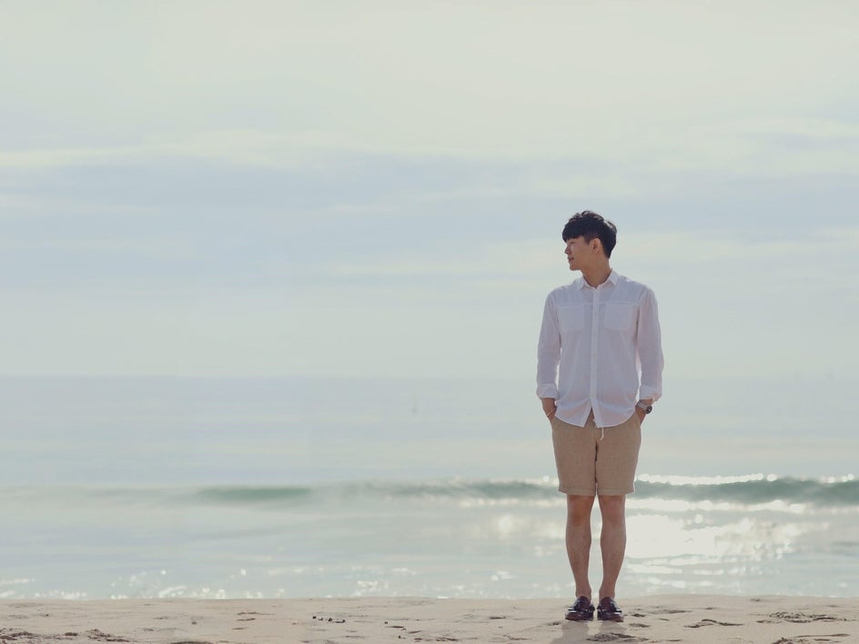 After: Ex removed from photo so only man is left on beach