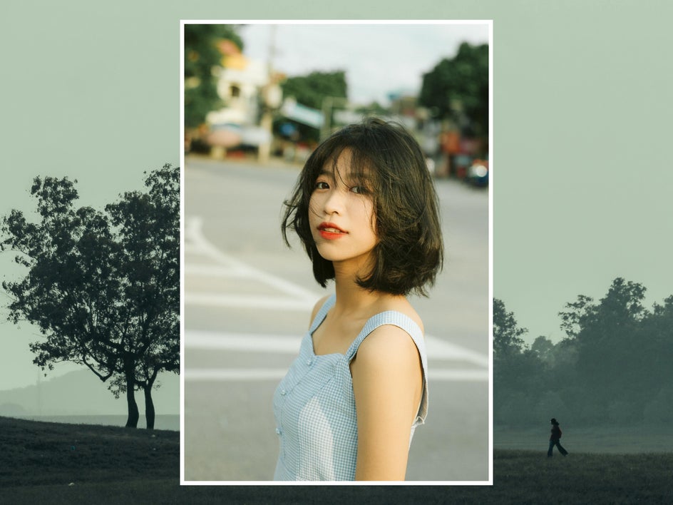 before: female street portrait with park in background