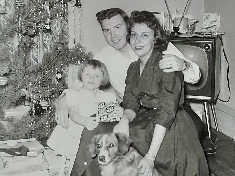 after: family photo black and white with clearer details in faces and objects