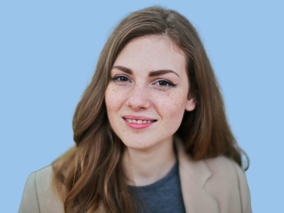 After: Headshot with clean professional backdrop after background remover tool is applied