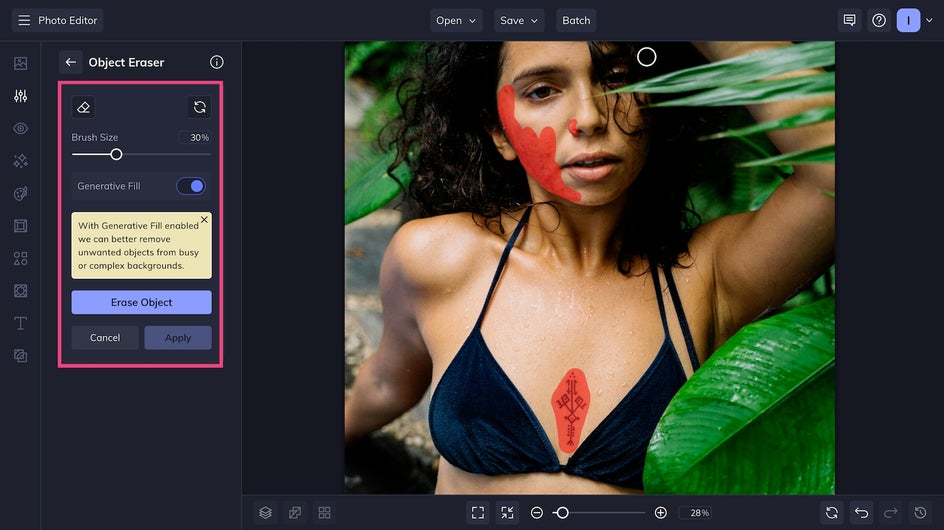 Screenshot showing the Object Eraser brush tool highlighting a tattoo and blemishes on a subject’s face for removal.