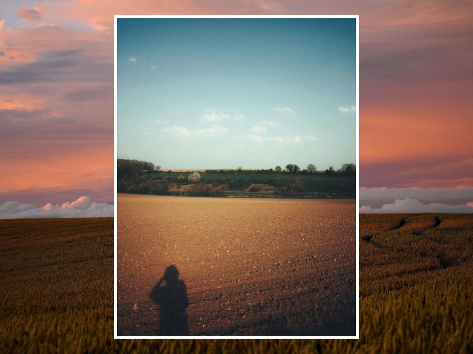 Before: Landscape photo of fields and blue sky
